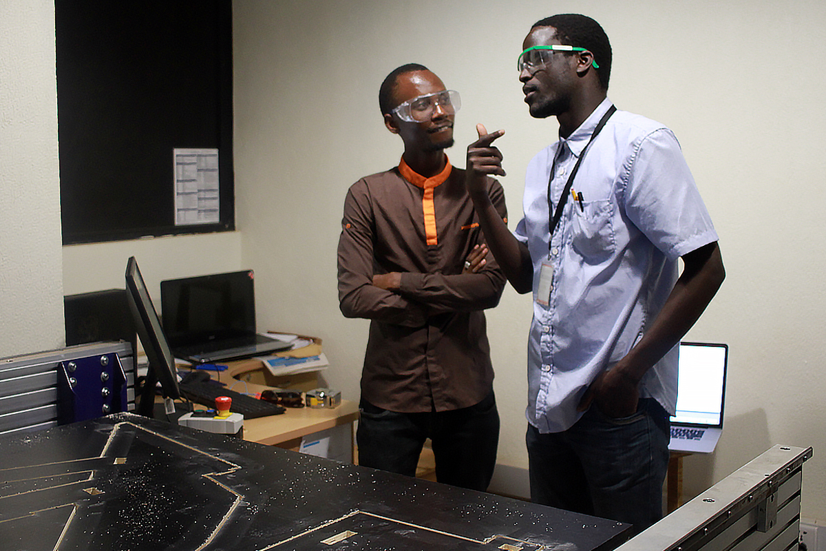 Photo: ADC Fellows in the FAB LAB fabricating a chair during an Autodesk workshop
