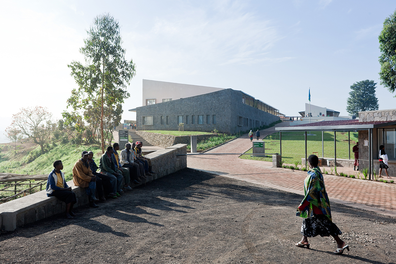 Photo of the Butaro District Hospital,  Photo by Iwan Baan, Front Entrance with Community Members