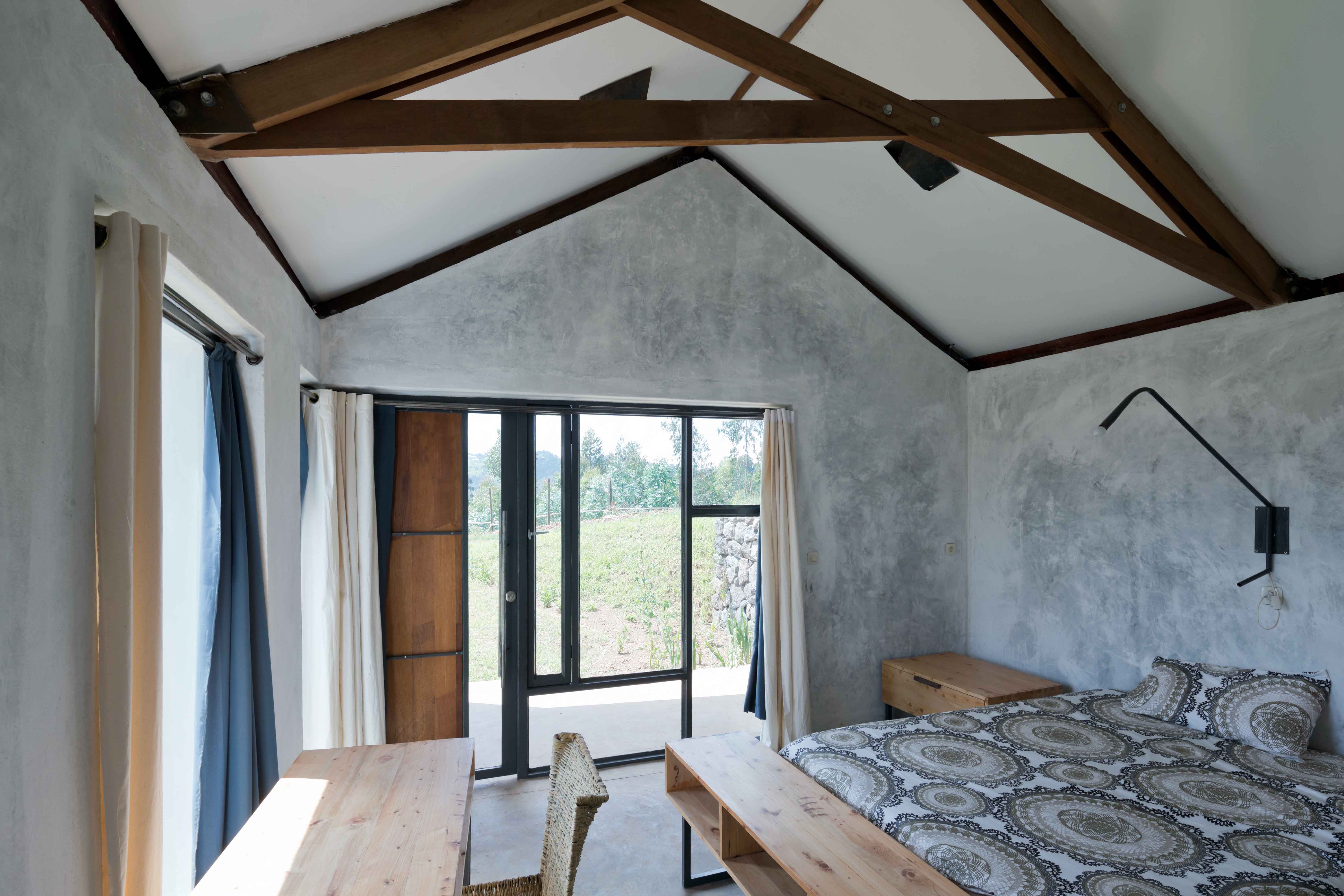 Photo of Butaro Doctors' Housing, Photo by Iwan Baan, Daytime View of Bedroom