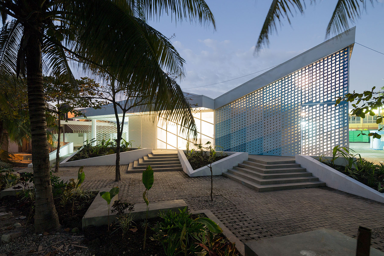Photo of GHESKIO Cholera Treatment Center, Photo by Iwan Baan, evening photograph of the metal facade
