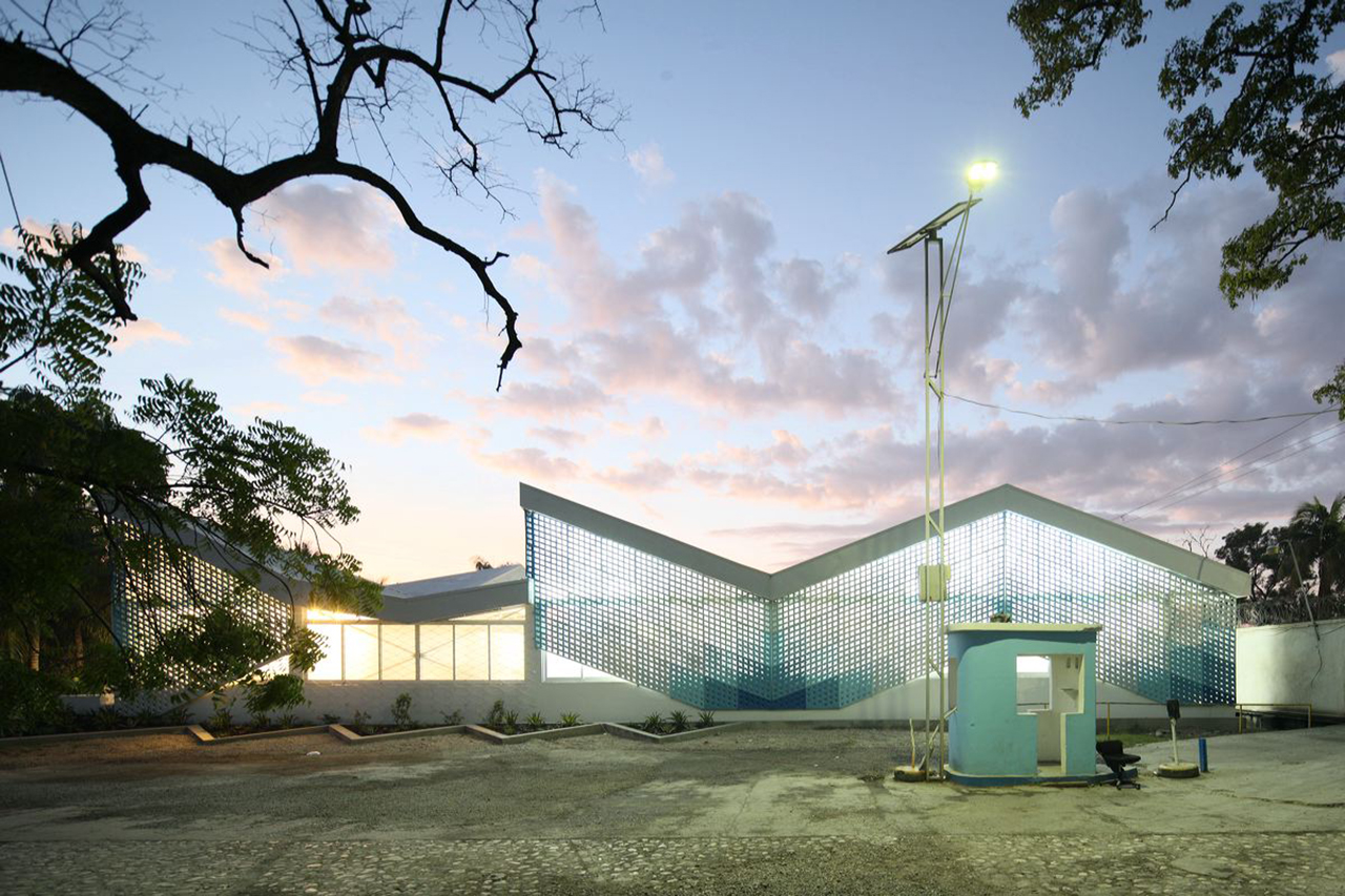 Photo of Gheskio Cholera Treatment Center, Photo by Iwan Baan, Exterior Nighttime View of the Cholera Treatment Center with Gatehouse