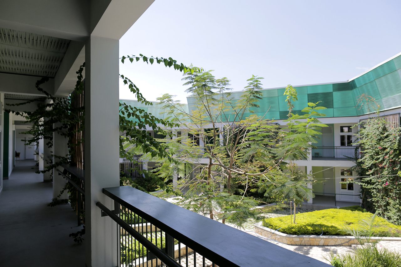 Photo of GHESKIO Tuberculosis Hospital, View of Courtyard from Second Level Exterior Hallway
