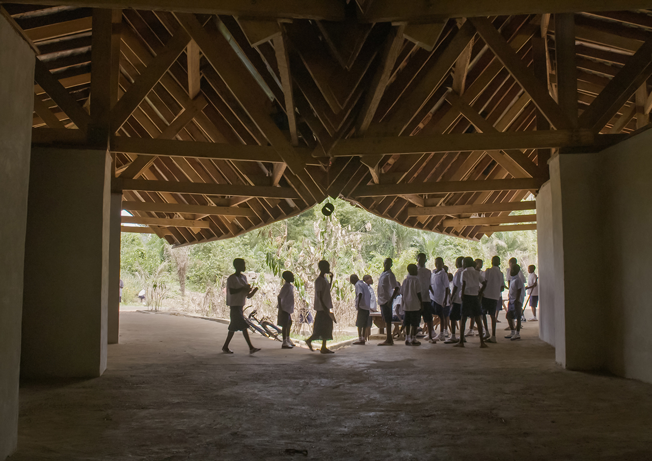 Photo of Ilima Primary School, View from the Hallway to the Exterior Landscacpe and of the school children gathering
