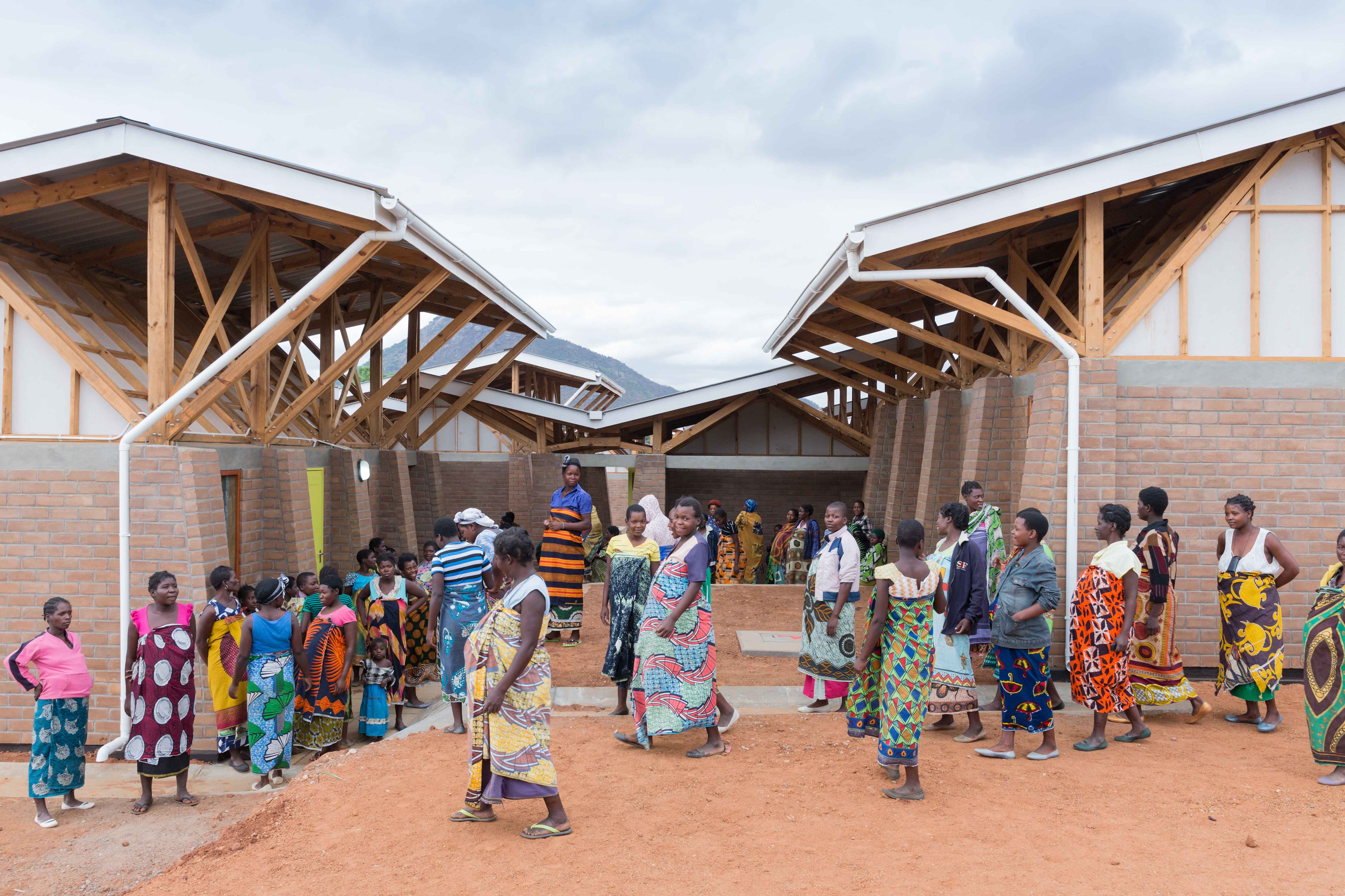 Photo of Maternity Waiting Village, Photo by Iwan Baan, Mothers gather in a courtyard