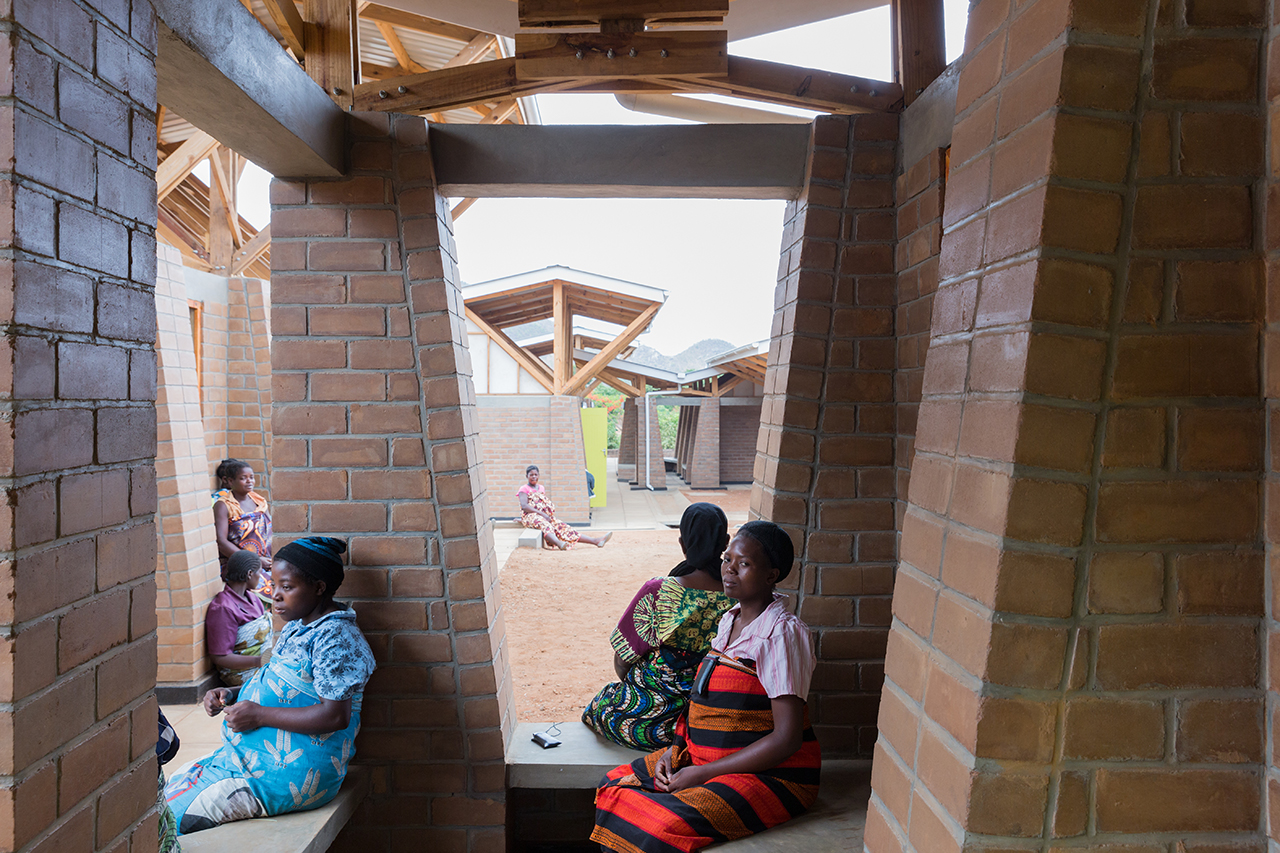 Photo of Maternity Waiting Village, Photo by Iwan Baan, Mothers sit with each other