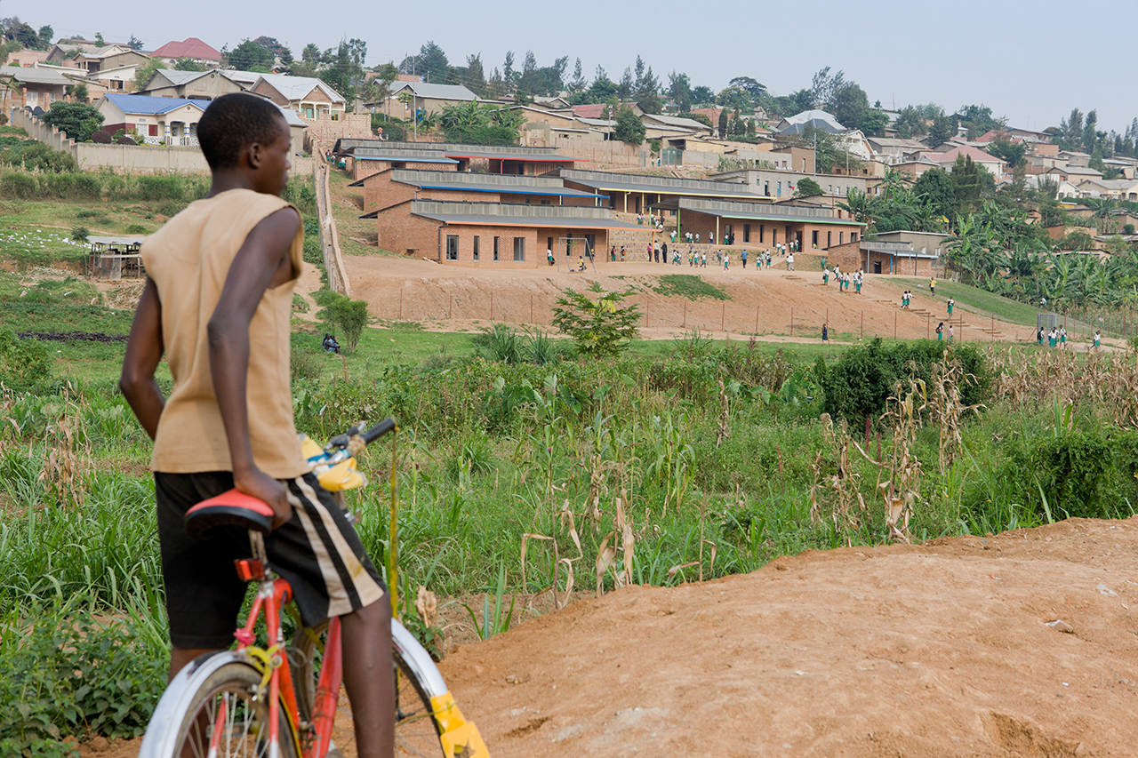 Photo of the Umubano Primary School, Photo by Iwan Baan, Photo of Surrounding Landscape and Boy on his Bike