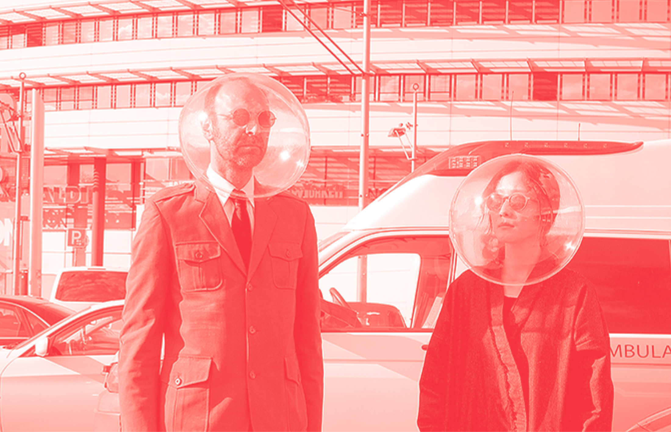 Image of two people wearing plastic bubbles on their heads. iSphere, 2020 Marco Canevacci and Yena Young, Plastique Fantastique (Berlin, Germany, founded 1999), Photograph: Marco Barotti, Courtesy of Plastique Fantastique.